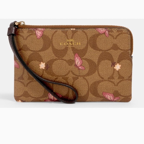Coach Handbags - COACH ZIP WRISTLET IN SIGNATURE CANVAS w/ 🦋 PRINT